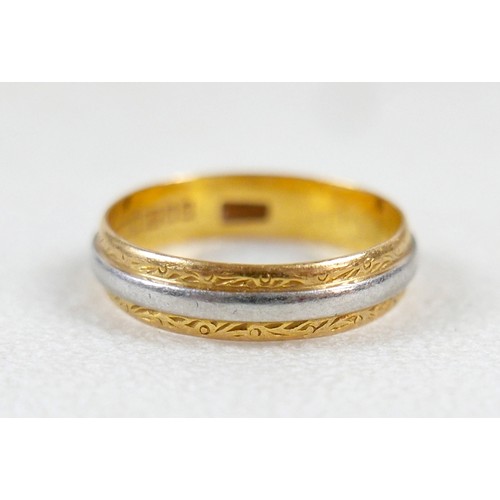 49 - A 22ct yellow and white metal banded ring size M, 4mm band, 3.1g.