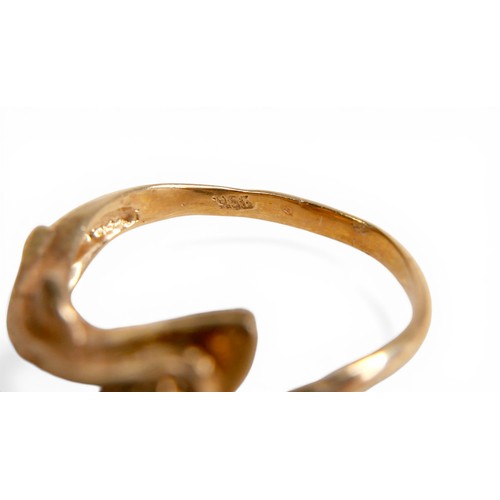 51 - A gold dolphin ring, with indistinct markings, size M, 4.0g.