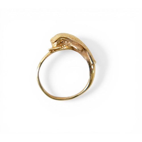 51 - A gold dolphin ring, with indistinct markings, size M, 4.0g.