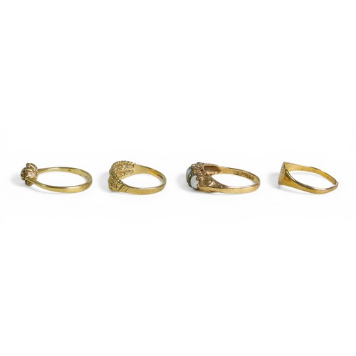 52 - Four 9ct gold rings plus a pair of gold metal plated earrings. Rings: opal, (lacks one stone), 2.2g.... 
