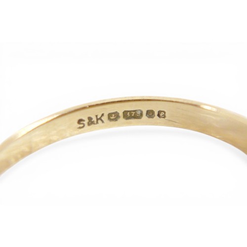 52 - Four 9ct gold rings plus a pair of gold metal plated earrings. Rings: opal, (lacks one stone), 2.2g.... 