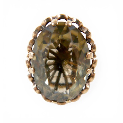 55 - A 9ct yellow gold citrine/quartz ring size L, head size 20 by 16 by 9mm, 5.8g.