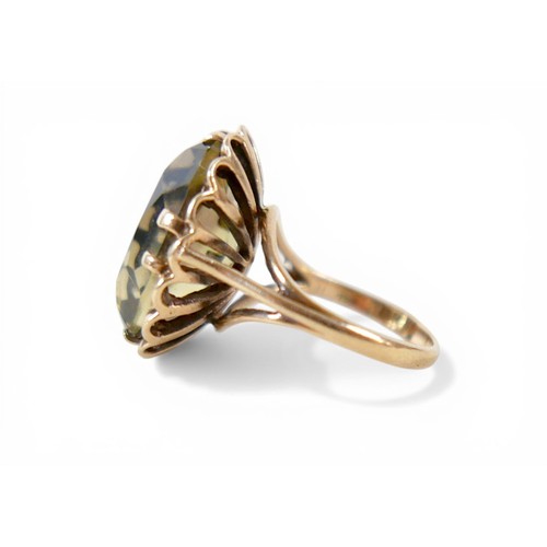55 - A 9ct yellow gold citrine/quartz ring size L, head size 20 by 16 by 9mm, 5.8g.