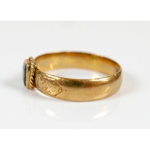57 - A Victorian Scottish 18ct yellow gold ring, set with an rectangular cut green stone, 5 by 4 by 2.5mm... 