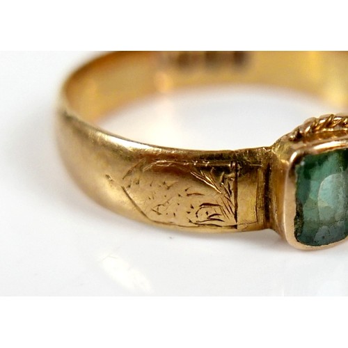 57 - A Victorian Scottish 18ct yellow gold ring, set with an rectangular cut green stone, 5 by 4 by 2.5mm... 