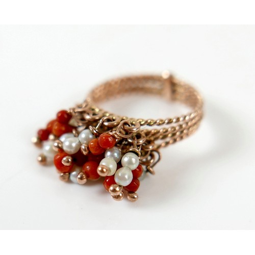 59 - An Egyptian gold coral and pearl ring marks for 18ct, size M, total weight 4.7g.