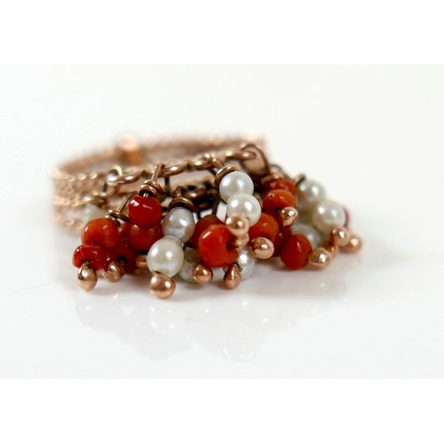 59 - An Egyptian gold coral and pearl ring marks for 18ct, size M, total weight 4.7g.