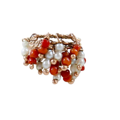 59 - An Egyptian gold coral and pearl ring marks for 18ct, size M, total weight 4.7g.