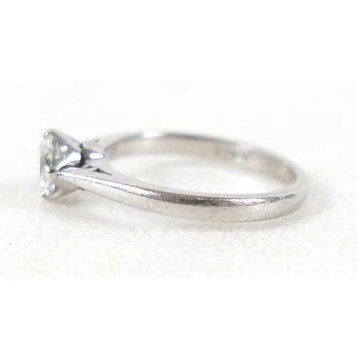 20 - A platinum and diamond solitaire ring, the brilliant cut stone approx 0.6ct, size K, 4.3g.