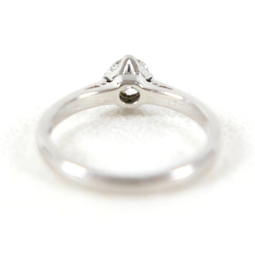 20 - A platinum and diamond solitaire ring, the brilliant cut stone approx 0.6ct, size K, 4.3g.