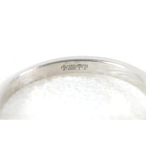 20 - A platinum and diamond solitaire ring, the brilliant cut stone approx 0.6ct, size K, 4.3g.