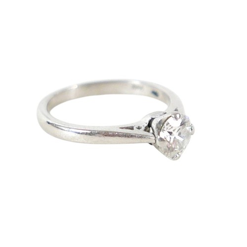 20 - A platinum and diamond solitaire ring, the brilliant cut stone approx 0.6ct, size K, 4.3g.