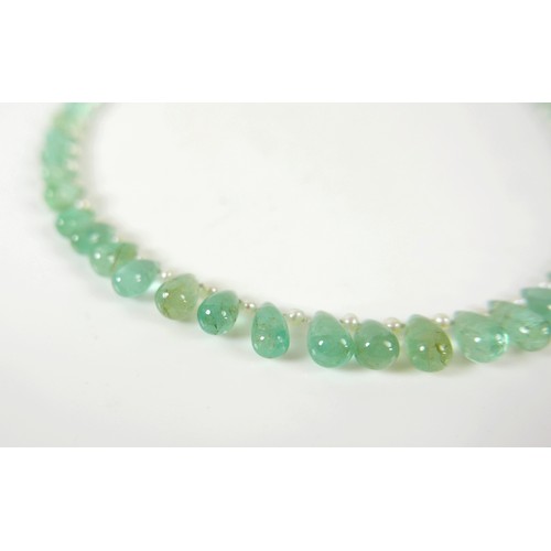 17 - An emerald and pearl necklet, made by Heidi Kjeldsen, Oakham, consisting of fifty five graduating po... 