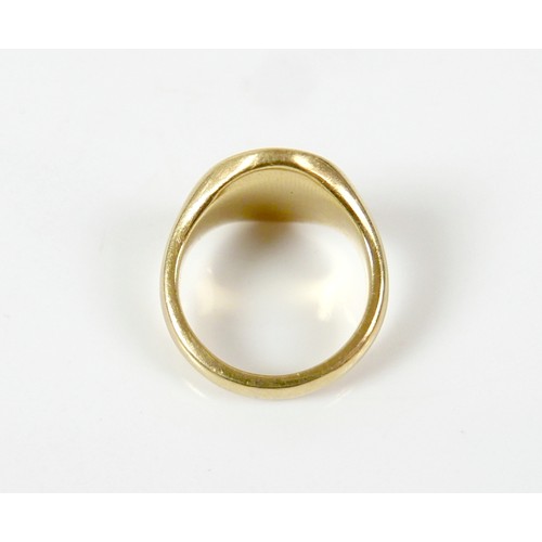 19 - An 18ct yellow gold signet ring with crowned dragon motto size J, 10.5g.