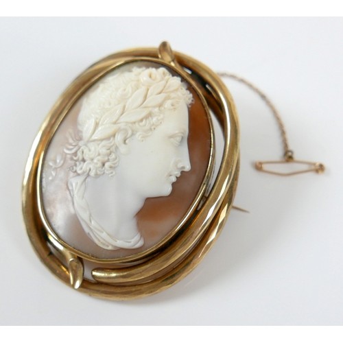 2 - A fine and impressive Victorian yellow metal cameo of Caesar Augustus in profile, overall 7 by 5 by ... 