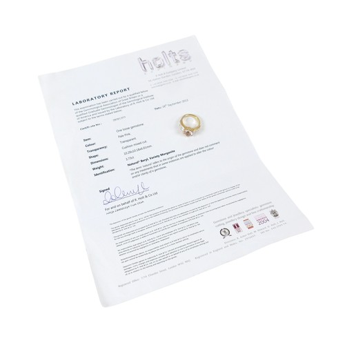 8 - A yellow gold Beryl Morganite and diamond ring set with a central cushion cut stone measuring approx... 