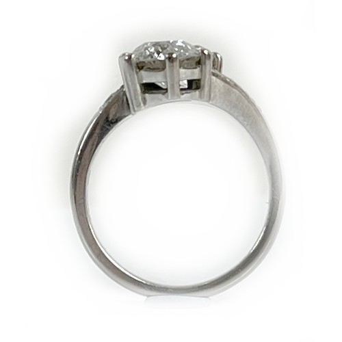 1 - An 18ct white gold and diamond crossover ring, 'Toi et Moi', made by Heidi Kjeldsen of Oakham using ... 