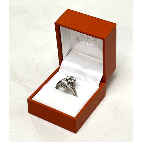 1 - An 18ct white gold and diamond crossover ring, 'Toi et Moi', made by Heidi Kjeldsen of Oakham using ... 