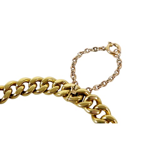 3 - A heavy Portuguese yellow metal kerb link bracelet 7mm links, 41.0g, surface tests to  approximately... 