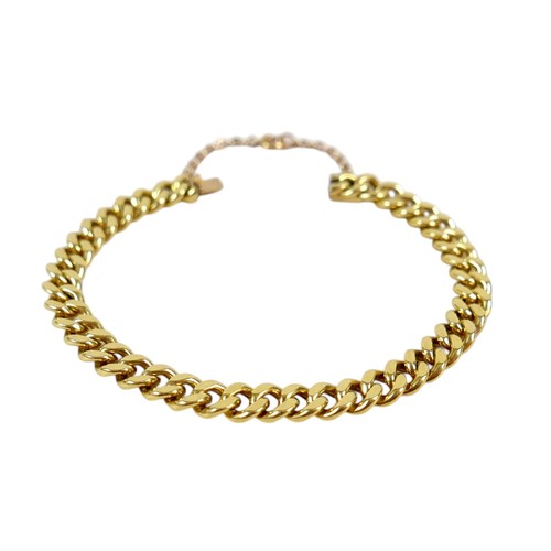 3 - A heavy Portuguese yellow metal kerb link bracelet 7mm links, 41.0g, surface tests to  approximately... 