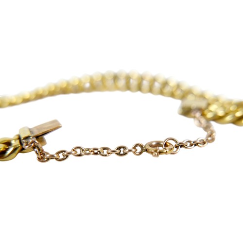 3 - A heavy Portuguese yellow metal kerb link bracelet 7mm links, 41.0g, surface tests to  approximately... 