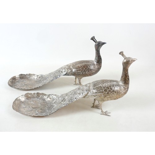 218 - A fine and large pair of Art Deco Hanau silver table models of peacocks, each in standing pose with ... 