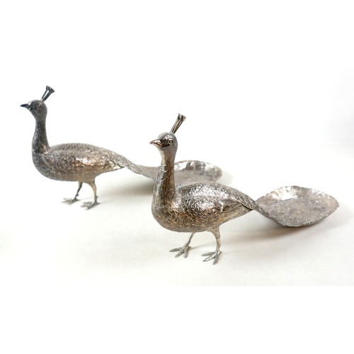 218 - A fine and large pair of Art Deco Hanau silver table models of peacocks, each in standing pose with ... 
