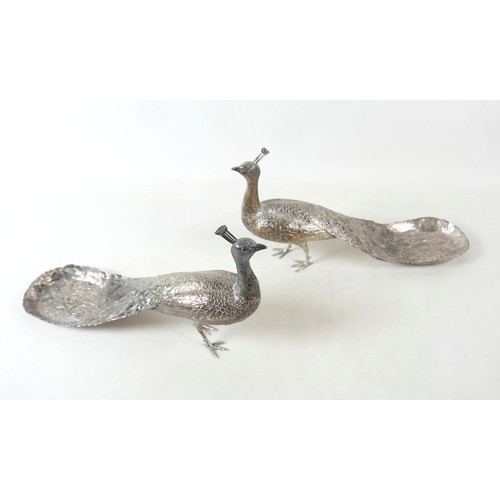 218 - A fine and large pair of Art Deco Hanau silver table models of peacocks, each in standing pose with ... 