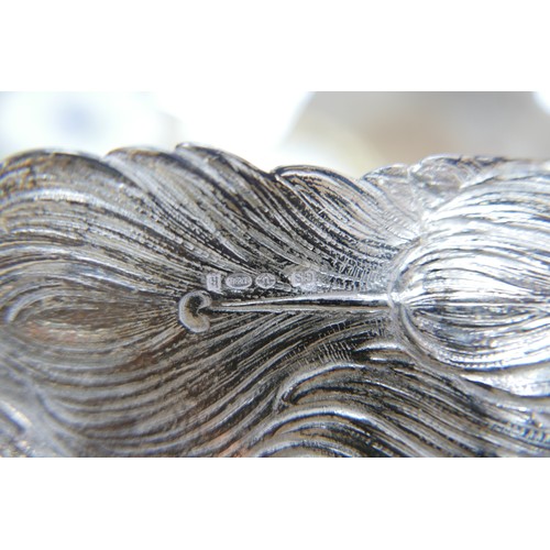 218 - A fine and large pair of Art Deco Hanau silver table models of peacocks, each in standing pose with ... 