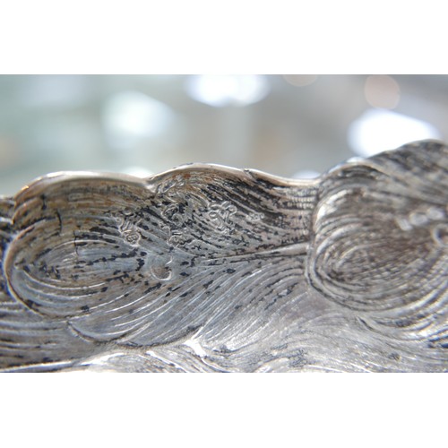 218 - A fine and large pair of Art Deco Hanau silver table models of peacocks, each in standing pose with ... 