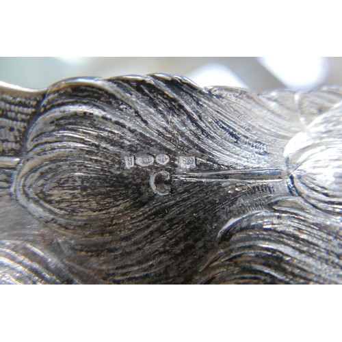 218 - A fine and large pair of Art Deco Hanau silver table models of peacocks, each in standing pose with ... 