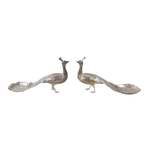 218 - A fine and large pair of Art Deco Hanau silver table models of peacocks, each in standing pose with ... 