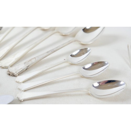 219 - An Elizabeth II silver suite of cutlery, by Elkington & Co, comprising four tablespoons, 21.7cm long... 