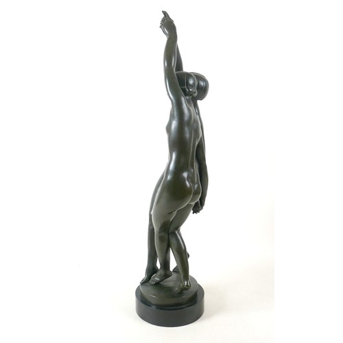 268 - A large French bronze of two nude girls dancing signed P Duberry standing on a round black marble ba... 