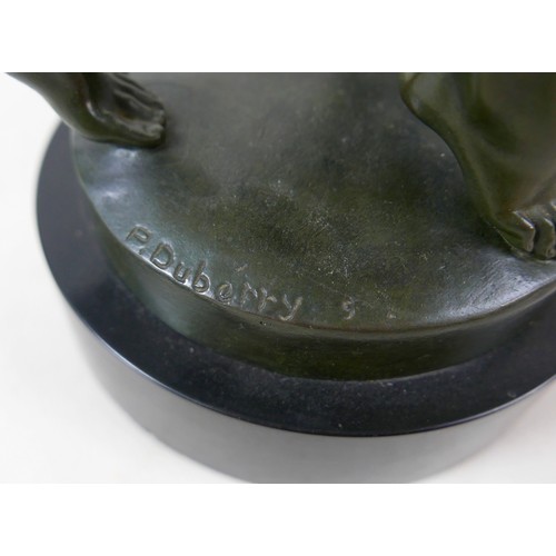 268 - A large French bronze of two nude girls dancing signed P Duberry standing on a round black marble ba... 