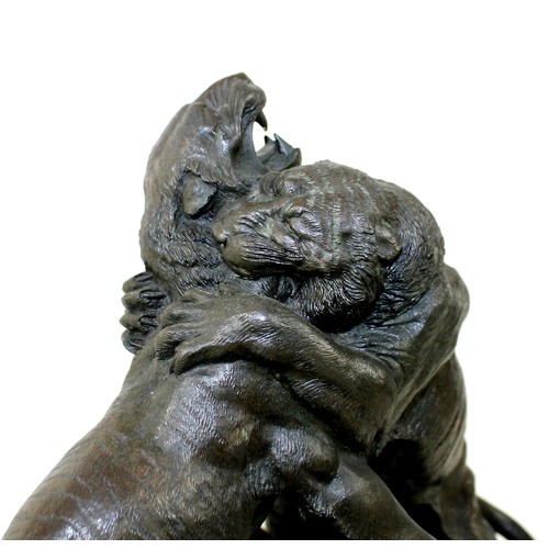 269 - Sir Joseph Edgar Boehm (Viennese, 1834-1890): A bronze group of three tigers, depicting two male tig... 