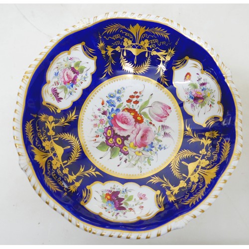 381 - An extensive early 19th century Derby dessert service painted with panels of floral sprays within gi... 