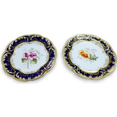 382 - A fine Coalport dessert service, circa 1840, finely painted with botanical specimens, believed to be... 