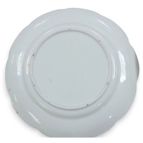 382 - A fine Coalport dessert service, circa 1840, finely painted with botanical specimens, believed to be... 