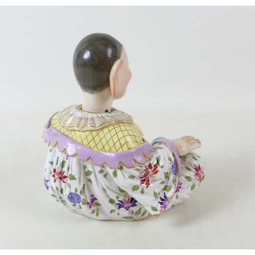 383 - A 19th century Meissen porcelain (Germany) male pagoda nodder figure, 18 by 9 by 19cm high.
In the e... 