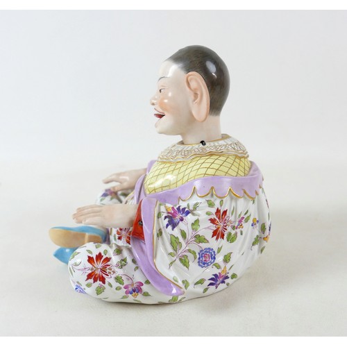 383 - A 19th century Meissen porcelain (Germany) male pagoda nodder figure, 18 by 9 by 19cm high.
In the e... 