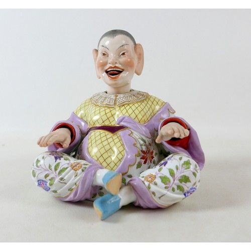 383 - A 19th century Meissen porcelain (Germany) male pagoda nodder figure, 18 by 9 by 19cm high.
In the e... 