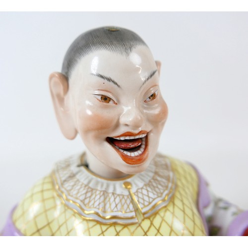 383 - A 19th century Meissen porcelain (Germany) male pagoda nodder figure, 18 by 9 by 19cm high.
In the e... 