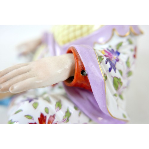 383 - A 19th century Meissen porcelain (Germany) male pagoda nodder figure, 18 by 9 by 19cm high.
In the e... 