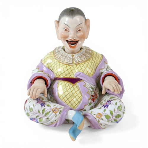 383 - A 19th century Meissen porcelain (Germany) male pagoda nodder figure, 18 by 9 by 19cm high.
In the e... 