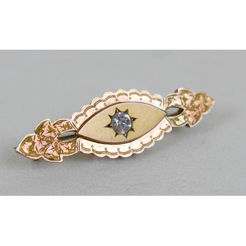 40 - A small group of jewellery, comprising a Victorian gilt metal brooch, set with a 4.5mm white stone, ... 