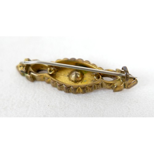 40 - A small group of jewellery, comprising a Victorian gilt metal brooch, set with a 4.5mm white stone, ... 