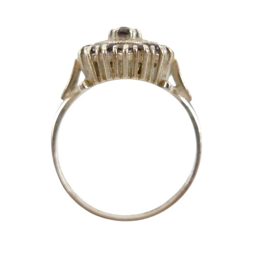 27 - A 9ct gold garnet cluster ring, size O, 2.8g.