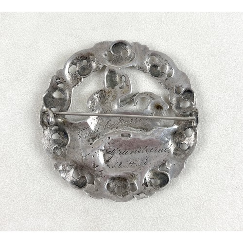 29 - A Norwegian 830 silver large brooch, modelled as the Norwegian character Nils Og Blåmann, with prese... 