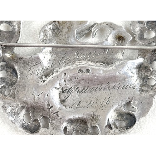 29 - A Norwegian 830 silver large brooch, modelled as the Norwegian character Nils Og Blåmann, with prese... 